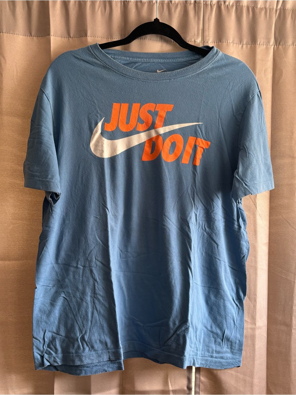 Nike Men’s Light Blue Graphic 'Just Do It' T-Shirt with Orange and White Logo